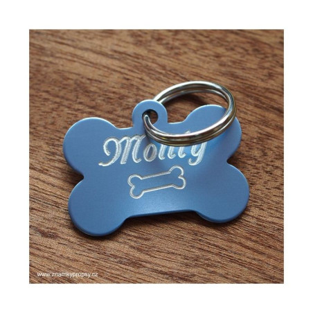 Identifikační známka světle modrá kostička se jménem a telefonem